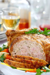 Celebratory food. Baked chicken stuffed with ham and mushrums for festive dinner