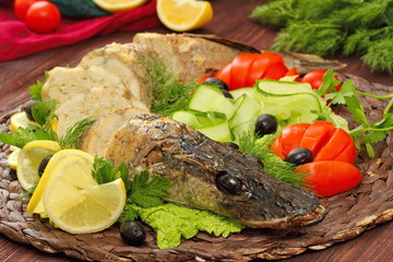 Celebratory food. Stuffed pike on served table