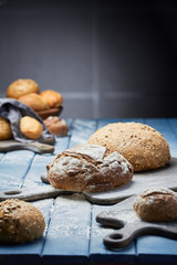 Fresh bread on a blue table in the bakery