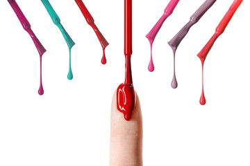 messy drop of red nail polish dripping  on nail isolated on white