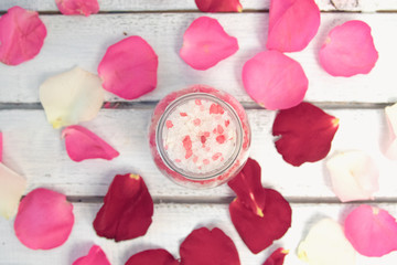 organic cosmetic with rose oil on white background top view.