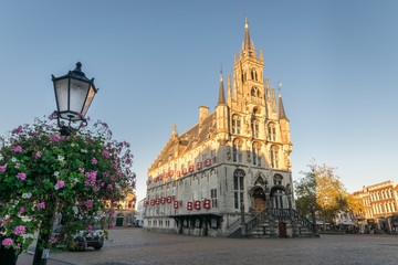 Gothic city hall of Gouda, The Netherlands at sunset