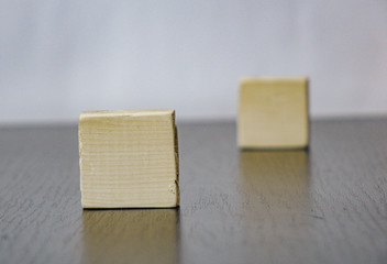 two wooden cubes