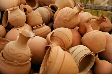 Fototapeta na wymiar Pottery. Handmade Ceramic Clay Jugs Closeup