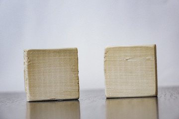 two wooden cubes