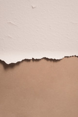 Background and texture of white disintegration and brown background.