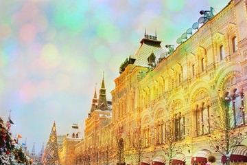 Naklejka premium New Year's facade of the building on Red Square in Moscow, GUM and the Christmas Fair, lights, decorated Christmas tree