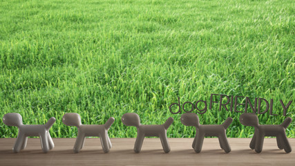 Obraz na płótnie Canvas Wooden table top or shelf with line of stylized dogs, dog friendly concept, love for animals, animal dog proof home, green grass park meadow, cool exterior design