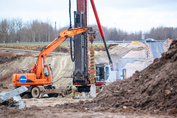 special construction equipment digs well for piles