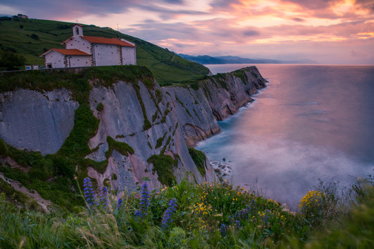 Zumaia's famous ermitage of San Telmo at the top of the cliffs above the basque coast, Basque Country.
