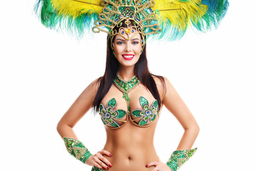 Brazilian woman posing in samba costume over white background