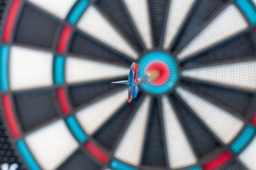 dart arrows in center of board - shallow depth of field