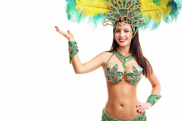 Fototapeta na wymiar Brazilian woman posing in samba costume over white background