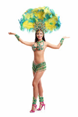 Fototapeta na wymiar Brazilian woman posing in samba costume over white background