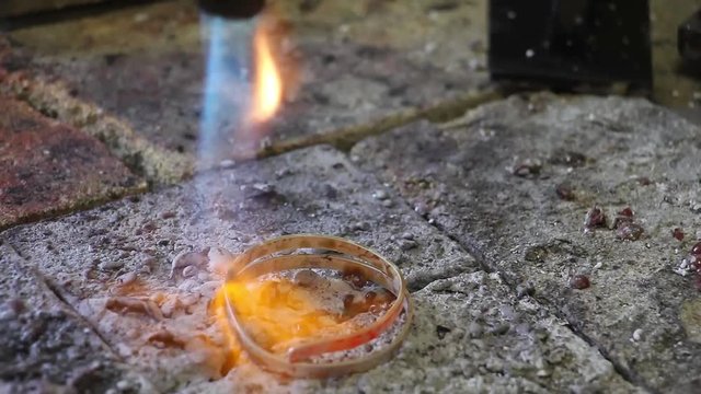 calefaction of curved silver blanks( with flux - composition against oxidation), workshop jewelry