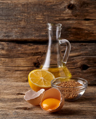 Delicious mayonnaise sauce  on wooden background. Homemade mayonnaise. Sour cream.