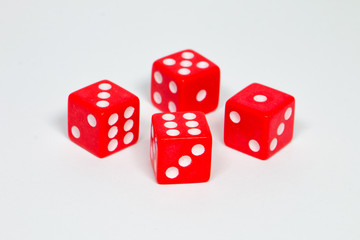 square dice in red on a white background