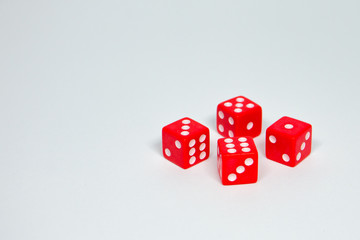 square dice in red on a white background