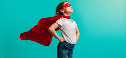 Girl in superhero costume - Powered by Adobe