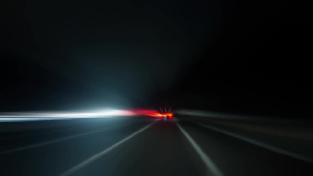 Driving View Fast Radial Blur Time-lapse. a timelapse driving traffic at night streaks blur