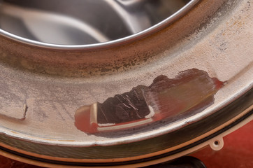 Washing machine and damaged drum scale