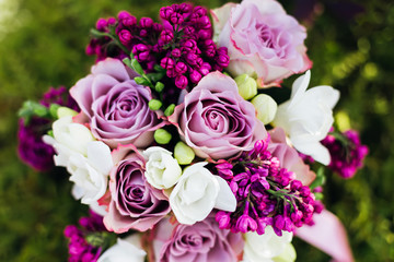 bouquet of roses and lilacs
