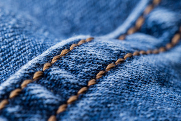 stitching on blue denim