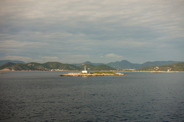 Fototapeta premium Lighthouse from the sea on the island of Ibiza