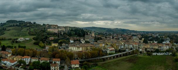 Aerial panorama view of Castrocaro di Terme, famous Italian thermal spa town in Cesena-Forli province, Emilia Romagna, near Terra del Sole, home to a Medici fortress castle in ruins a famous bridge