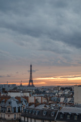 aerial view from the heights on paris and the eiffel tower at sunset