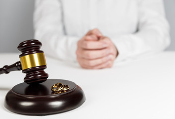 Judge gavel deciding on marriage divorce