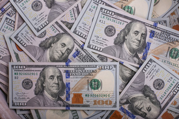American dollars in one hundred banknotes. Lot of dollars close up