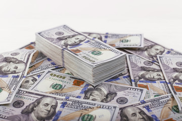 American dollars in one hundred banknotes. Lot of dollars close up