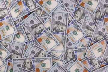 American dollars in one hundred banknotes. Lot of dollars close up