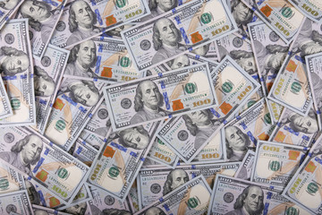 American dollars in one hundred banknotes. Lot of dollars close up