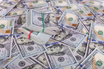 American dollars in one hundred banknotes. Lot of dollars close up