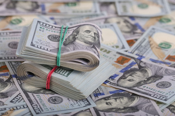 American dollars in one hundred banknotes. Lot of dollars close up