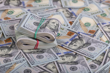 American dollars in one hundred banknotes. Lot of dollars close up