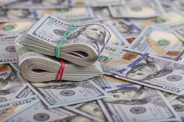 American dollars in one hundred banknotes. Lot of dollars close up