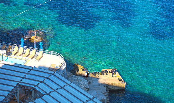 Aerial seascape view to turquoise waters of Adriatic Sea and islands distance, near town Dubrovnik in Croatia, summer scenery Europe. Famous scuba diving travel destination in Croatia, Dubrovnik
