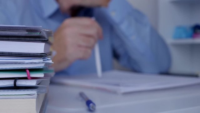 Impatiently Businessman Make Restless Gestures with Pencil on the Desk Surface
