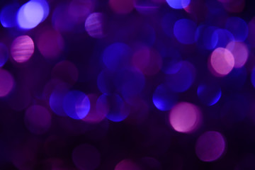 Bokeh. Holiday background. Christmas lights. Glitter. Defocused sparkles. New Year backdrop....