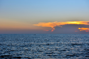 sunset in punta braccetto beach, ragusa, sicily, italy