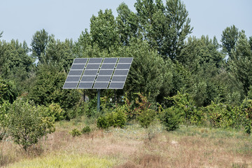 Post with solar panels in the middle of nowhere