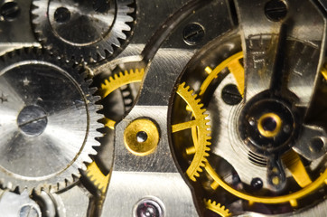 The mechanism of old antique pocket watches, Close up view of old clock's gears. selective focus