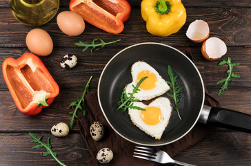.fried eggs in a skillet