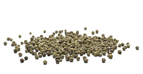 Dry green pepper pile, peppercorn isolated on white