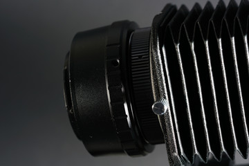 In macro photography and photomicrography, a bellows device is very helpful and almost indispensable