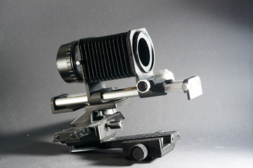 In macro photography and photomicrography, a bellows device is very helpful and almost indispensable