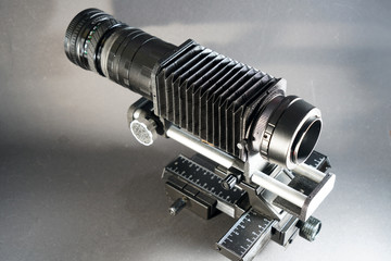 In macro photography and photomicrography, a bellows device is very helpful and almost indispensable